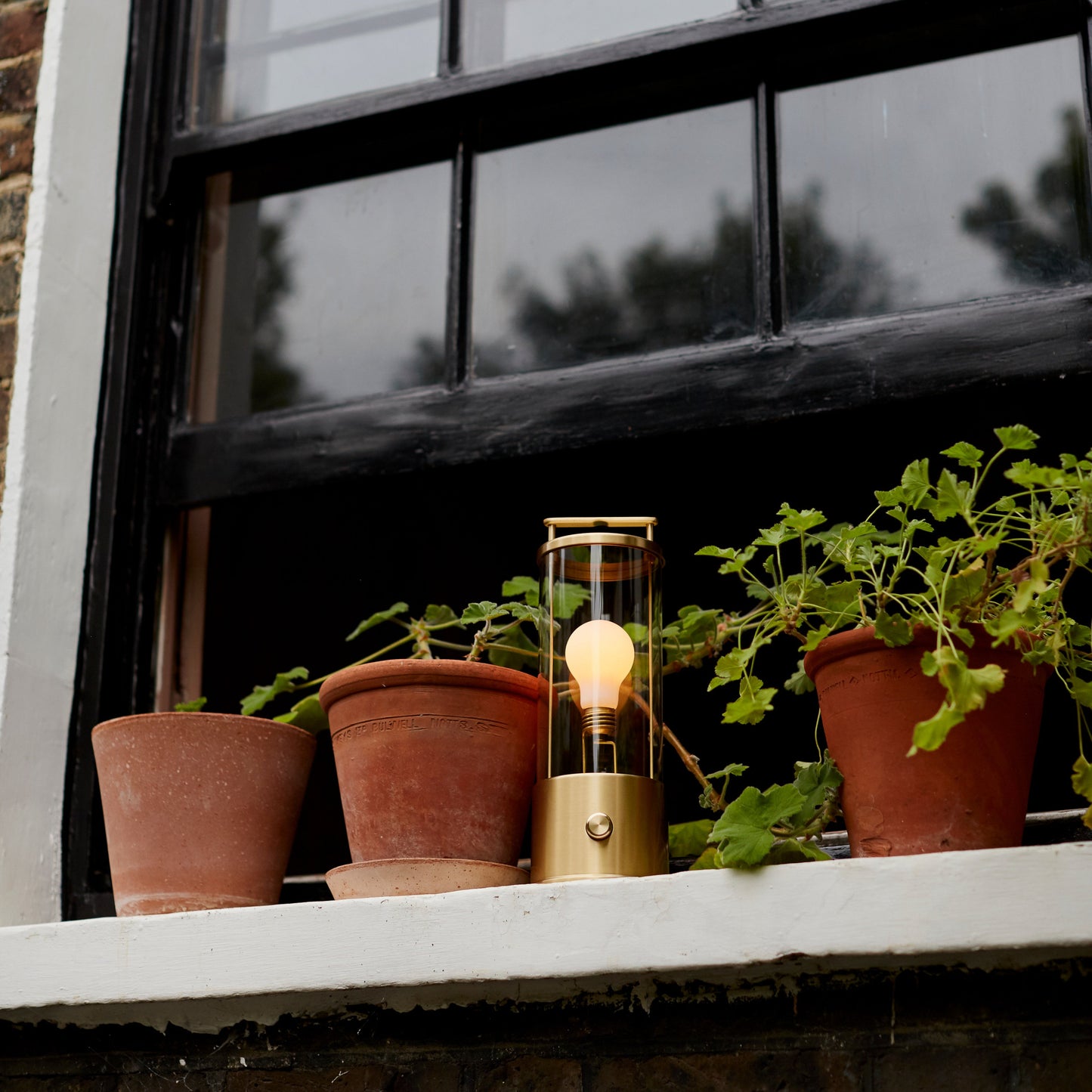 The Muse 2.0 Portable Lantern in Solid Brass