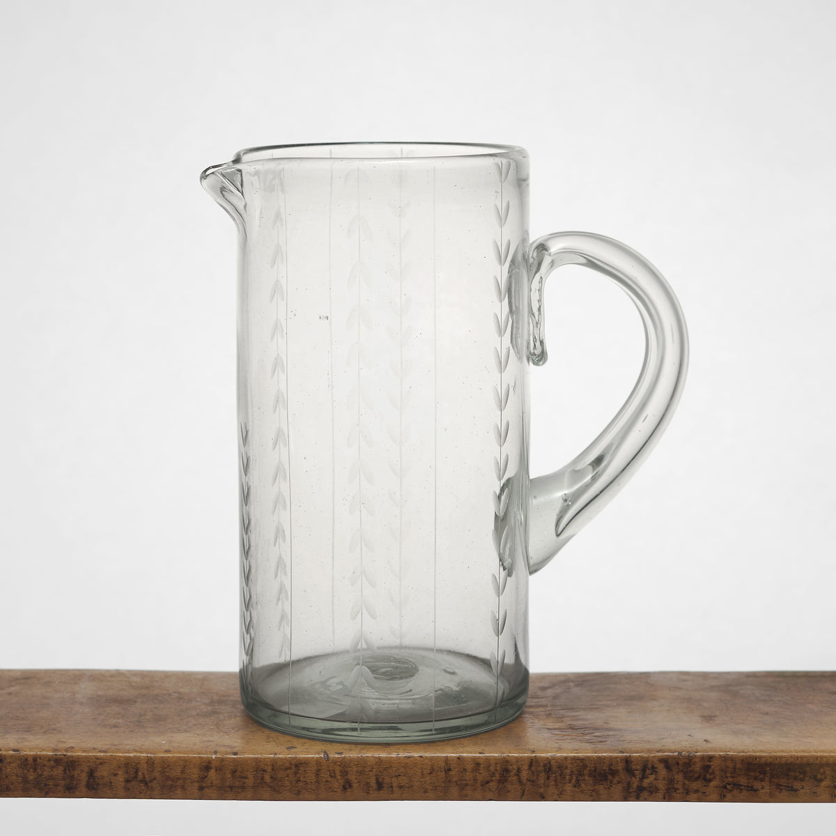 Leaf Etched Cylinder Pitcher in Blown Recycled Glass